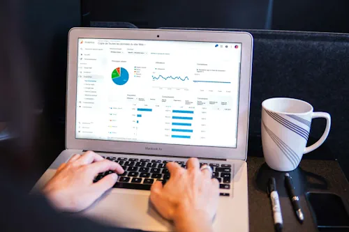A developer studying the Core Web Vitals metrics on the laptop. Sevinu, Shopify website designer in Brisbane. Photo from Unsplash.