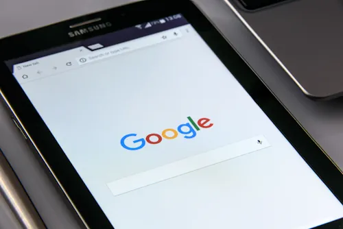 A developer studying the Core Web Vitals metrics on the laptop. Sevinu, Shopify website designer in Brisbane. Photo from Unsplash.